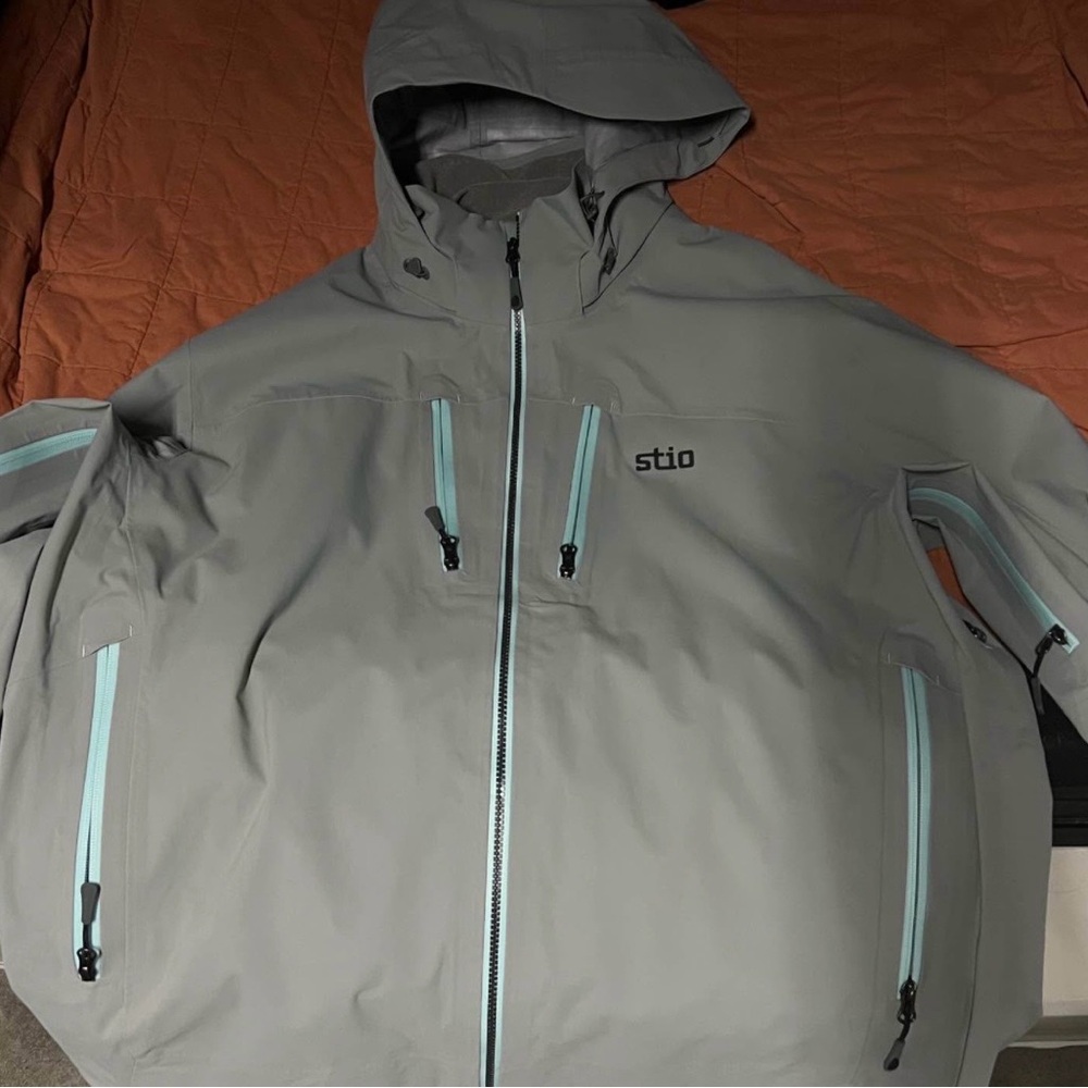 Stio Environ Gray Hooded Jacket with Blue Accents